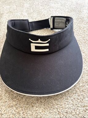Women’s Cobra Black Golf Visor with White Trim. Never Worn!